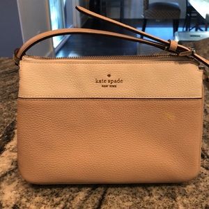 Kate spade tan and white bag.